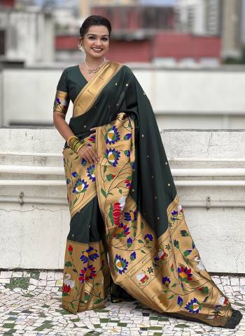 Garb These Party Wear Saree in Fine Colored.These Saree And Blouse is Fabricated On Paithani Silk.Its Beautified With Weaving Meenakari Polka Motifs Designer.