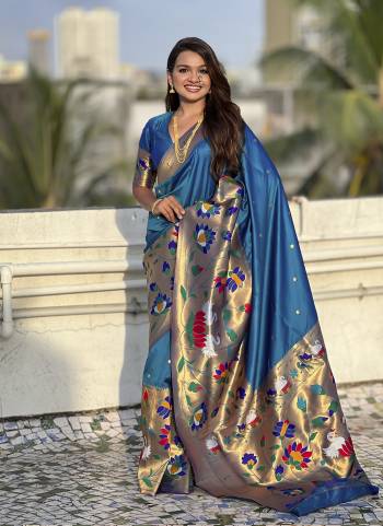 Garb These Party Wear Saree in Fine Colored.These Saree And Blouse is Fabricated On Paithani Silk.Its Beautified With Weaving Meenakari Polka Motifs Designer.