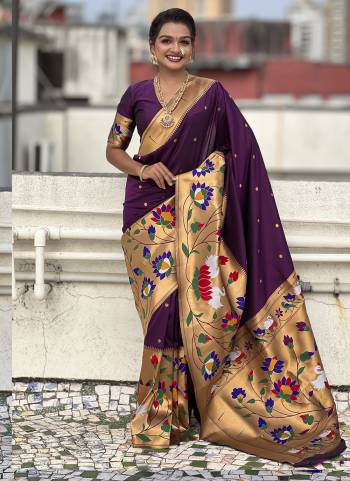 Garb These Party Wear Saree in Fine Colored.These Saree And Blouse is Fabricated On Paithani Silk.Its Beautified With Weaving Meenakari Polka Motifs Designer.