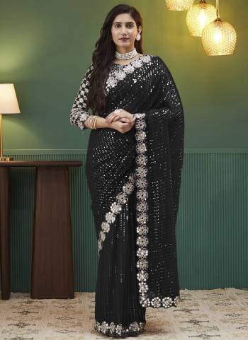 Attractive These Party Wear Saree in Fine Colored.These Saree Are Georgette And Blouse is Fabricated On Georgette.Its Beautified With Designer Sequance,Mirror Embroidery Work.