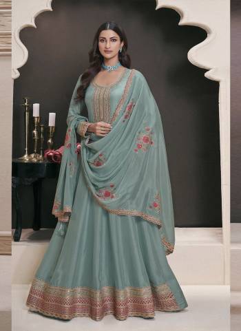 Garb These Party Wear Anarkali Suit in Fine Colored Pair With Dupatta.These Top Are Art Silk And Dupatta Are Georgette And Pair With Dull Santoon Bottom.Its Beautified With Designer Embroidery Work.