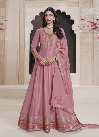 Garb These Party Wear Anarkali Suit in Fine Colored Pair With Dupatta.These Top Are Art Silk And Dupatta Are Georgette And Pair With Dull Santoon Bottom.Its Beautified With Designer Embroidery Work.