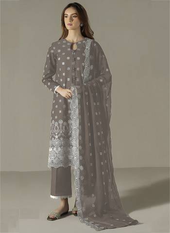 Looking These Designer Suit in Fine Colored Pair With Bottom And Dupatta.These Top Are Faux Georgette And Dupatta Are Fabricated On Faux Georgette Pair With Dull Santoon Bottom.Its Beautified With Santoon Inner.Its Beautified With Designer Embroidery Work.