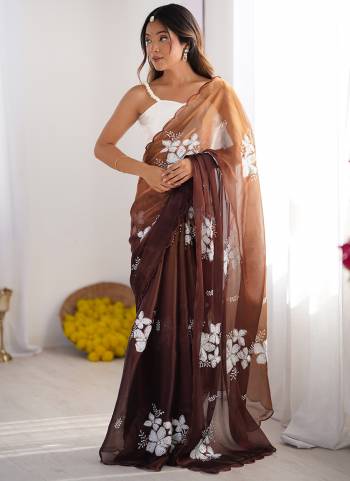 Garb These Party Wear Saree in Fine Padding Colored.These Saree Are Jimmy Choo And Blouse is Ultra Satin Fabricated.Its Beautified With Designer Dual Sequance Embroidery Work.