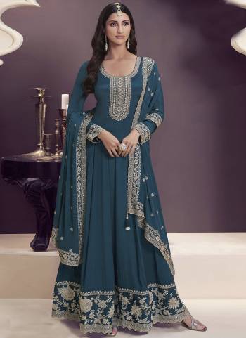 Looking These Party Wear Anarkali Suit in Fine Colored Pair With Dupatta.These Top Are Chinon And Dupatta Are Chinon And Pair With Dull Santoon Bottom.Its Beautified With Designer Embroidery Work.