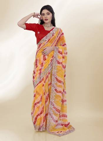 Attective These Saree in Fine Colored.These Saree Are Georgette And Blouse is Art Silk Fabricated.Its Beautified With Bandhani Printed,Embroidery Work Lace And Blouse.