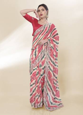 Attective These Saree in Fine Colored.These Saree Are Georgette And Blouse is Art Silk Fabricated.Its Beautified With Bandhani Printed,Embroidery Work Lace And Blouse.