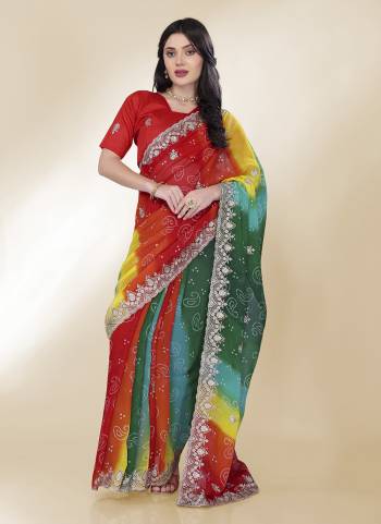 Attective These Saree in Fine Colored.These Saree Are Georgette And Blouse is Art Silk Fabricated.Its Beautified With Bandhani Printed,Embroidery Work Lace And Blouse.