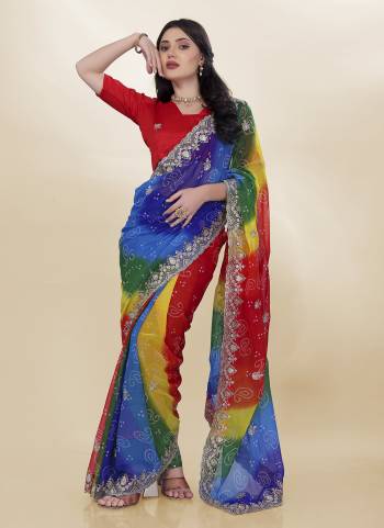 Attective These Saree in Fine Colored.These Saree Are Georgette And Blouse is Art Silk Fabricated.Its Beautified With Bandhani Printed,Embroidery Work Lace And Blouse.