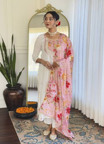 Garb These Suit in Fine Colored Pair With Bottom And Dupatta.These Top And Bottom Are Fabricated On Rayon Pair With Chiffon Dupatta.Its Beautified With Designer Embroidery Work, Printed .