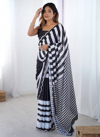 Attrective Looking These Party Wear Saree in Fine Colored.These Saree And Blouse is Chinon Fabricated.Its Beautified With Designer Digital Printed With Mirror Cut Work.