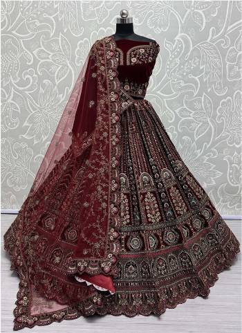 For A Fancy Designer Look,Grab These Lehenga Choli With 2 Dupatta in Fine Colored.These Lehenga And Choli Are Velvet And Dupatta Are Fabricated On Soft Net & Velvet Pair.Its Beautified With Designer Sequance,Multy Thread,Dori,Jari Embroidery With Diamond Work. 