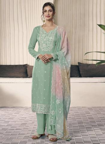 Looking These Party Wear Salwar Suit in Fine Colored Pair With Dupatta.These Top Are Art Silk And Dupatta Are Chiffon And Pair With Santoon Bottom.Its Beautified With Designer Embroidery Work.