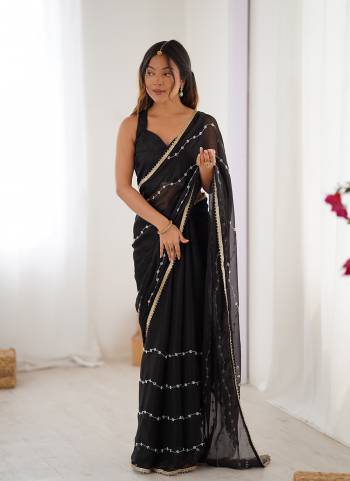 Looking These Party Wear Saree in Fine Colored.These Saree Are Sitara Chiffon And Blouse is Mono Banglori Fabricated.Its Beautified With Designer Beads Moti,Val Sequance Embroidery Work With Codding Lace Border.