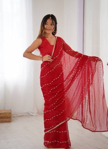 Looking These Party Wear Saree in Fine Colored.These Saree Are Sitara Chiffon And Blouse is Mono Banglori Fabricated.Its Beautified With Designer Beads Moti,Val Sequance Embroidery Work With Codding Lace Border.