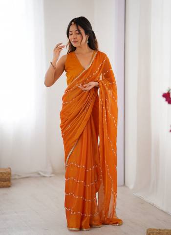 Looking These Party Wear Saree in Fine Colored.These Saree Are Sitara Chiffon And Blouse is Mono Banglori Fabricated.Its Beautified With Designer Beads Moti,Val Sequance Embroidery Work With Codding Lace Border.