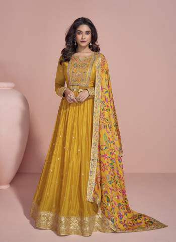 Garb These Party Wear Anarkali Suit in Fine Colored Pair With Dupatta.These Top Are Chinon And Dupatta Are Chinon And Pair With Santoon Inner.Its Beautified With Designer Embroidery Work With Printed Dupatta.