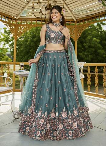 Attrective Looking This Party Wear Fine Color Fancy Heavy Designer Choli And Lahenga Fabriced On Satin And Dupatta Net In Fabricated Beautified With Attrective Designer Heavy Sequance,Multy Thread Embroidery Work. Buy Now.
