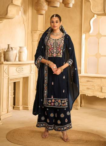Looking These Party Wear Designer Plazzo Suits in Fine Colored Pair With Dupatta.These Top Are Velvet And Dupatta Are Fabricated On Velvet Pair With Velvet Bottom.Its Beautified With Designer Embroidery Work.
