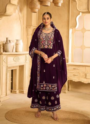 Looking These Party Wear Designer Plazzo Suits in Fine Colored Pair With Dupatta.These Top Are Velvet And Dupatta Are Fabricated On Velvet Pair With Velvet Bottom.Its Beautified With Designer Embroidery Work.