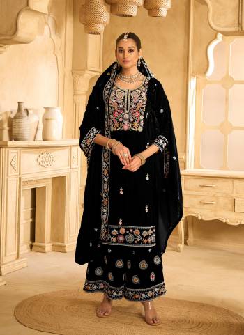 Looking These Party Wear Designer Plazzo Suits in Fine Colored Pair With Dupatta.These Top Are Velvet And Dupatta Are Fabricated On Velvet Pair With Velvet Bottom.Its Beautified With Designer Embroidery Work.