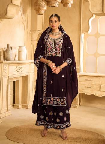 Looking These Party Wear Designer Plazzo Suits in Fine Colored Pair With Dupatta.These Top Are Velvet And Dupatta Are Fabricated On Velvet Pair With Velvet Bottom.Its Beautified With Designer Embroidery Work.