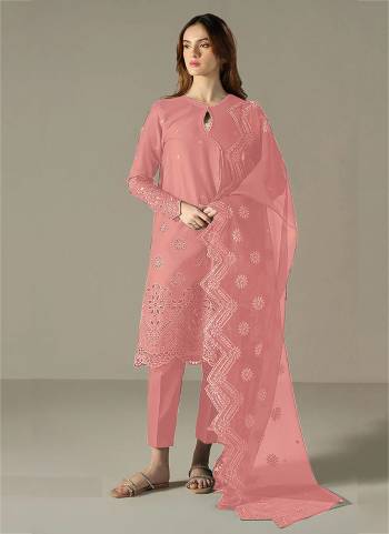 Garb These Designer Suit in Fine Colored Pair With Bottom And Dupatta.These Top Are Cotton And Dupatta Are Fabricated On Organza Pair With Cotton Bottom.Its Beautified With Santoon Inner.Its Beautified With Designer Embroidery Work.