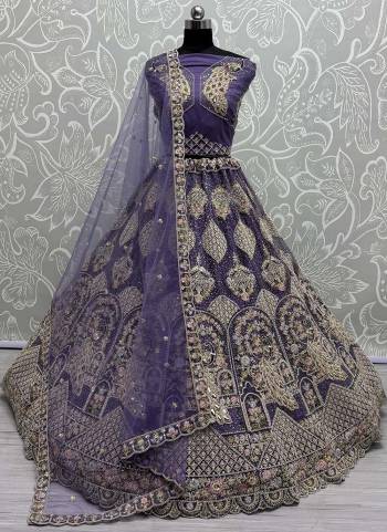 For A Fancy Designer Look,Grab These Lehenga Choli With Dupatta in Fine Colored.These Lehenga And Choli Are Net And Dupatta Are Fabricated On Soft Net Pair.Its Beautified With Designer Peacock Pattern,Sequance,Multy Thread,Dori,Jari Embroidery With Diamond Work. 