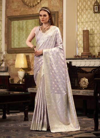 Looking These Party Wear Saree in Fine Colored.These Saree Are Satin Silk And Blouse is Fabricated On Satin Silk.Its Beautified With Weaving Jari Designer.