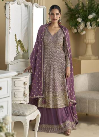 Garb These Party Wear Plazzo Suit in Fine Colored Pair With Dupatta.These Top And Bottom Are Georgette And Dupatta Are Georgette And Pair With Santoon Inner.Its Beautified With Heavy Designer Embroidery Work.