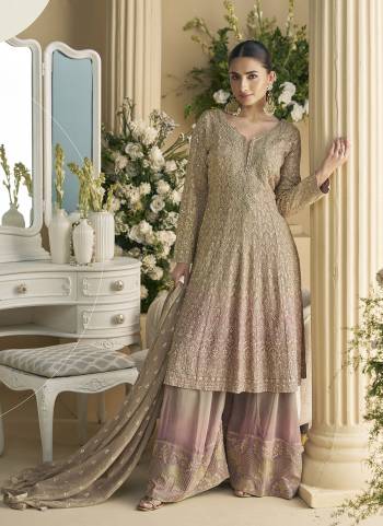 Garb These Party Wear Plazzo Suit in Fine Colored Pair With Dupatta.These Top And Bottom Are Georgette And Dupatta Are Georgette And Pair With Santoon Inner.Its Beautified With Heavy Designer Embroidery Work.