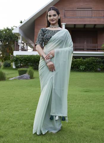 Looking These Party Wear Saree in Fine Colored Pair With Blouse.These Saree Are Georgette and Blouse Are Fabricated On Art Silk.Its Beautified With  Solid  With Embroidery Work Blouse.