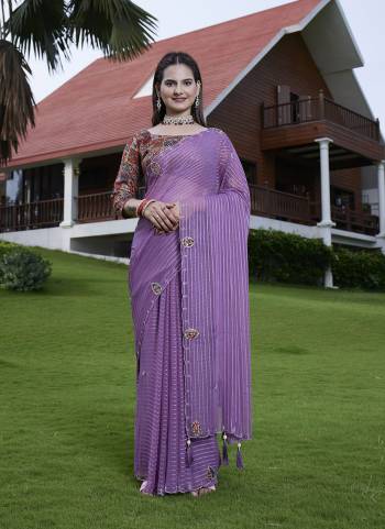 Looking These Party Wear Saree in Fine Colored Pair With Blouse.These Saree Are Georgette and Blouse Are Fabricated On Gajji Silk.Its Beautified With Wevon Lining Designer With Calcutta Zardishi,Diamond Hand Embroidery Work.