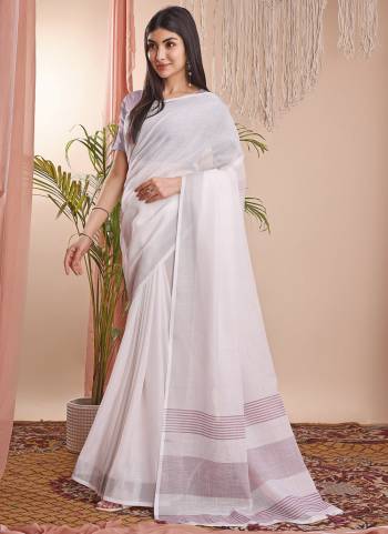 Looking These Fastive Wear Saree in Fine Colored.These Saree And Blouse is Fabricated On Linen Cotton.Its Beautified With Weavon Designer.