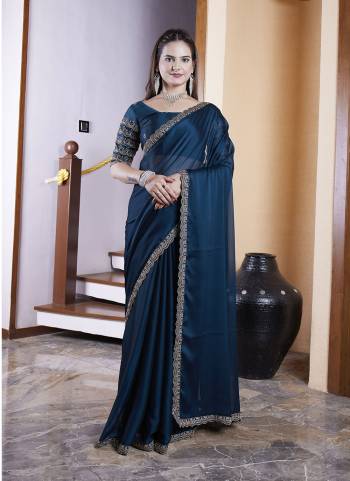 Garb These Party Wear Saree in Fine Colored Pair With Blouse.These Saree Are Chiffon and Blouse Are Fabricated On Chiffon.Its Beautified With Bits Lace Border With Hand Work Blouse Designer.