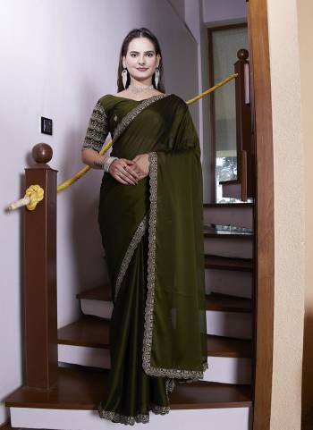 Garb These Party Wear Saree in Fine Colored Pair With Blouse.These Saree Are Chiffon and Blouse Are Fabricated On Chiffon.Its Beautified With Bits Lace Border With Hand Work Blouse Designer.