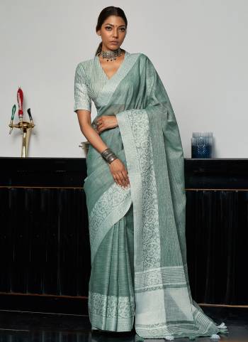 Looking These Party Wear Saree in Fine Colored.These Saree And Blouse is Fabricated On linen.Its Beautified With Weavon Designer.