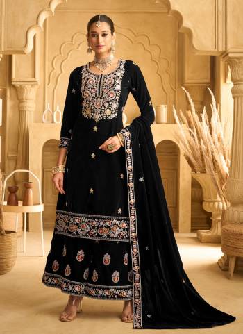 Looking These Party Wear Designer Plazzo Suits in Fine Colored Pair With Dupatta.These Top Are Velvet And Dupatta Are Fabricated On Velvet Pair With Velvet Bottom.Its Beautified With Designer Embroidery Work.