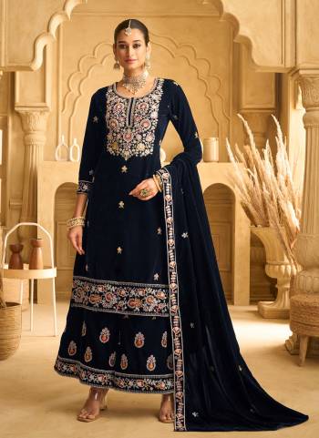 Looking These Party Wear Designer Plazzo Suits in Fine Colored Pair With Dupatta.These Top Are Velvet And Dupatta Are Fabricated On Velvet Pair With Velvet Bottom.Its Beautified With Designer Embroidery Work.