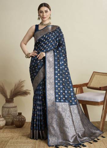 Garb This Party Wear Saree Paired With Blouse.This Saree And Blouse Are Satin Silk Fabric With Wevon Jari Designer. Buy This Pretty Saree Now.