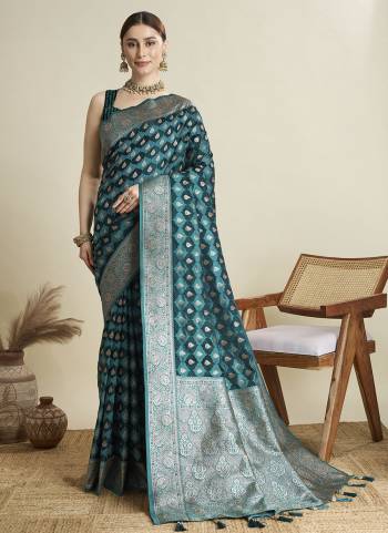 Garb This Party Wear Saree Paired With Blouse.This Saree And Blouse Are Satin Silk Fabric With Wevon Jari Designer. Buy This Pretty Saree Now.