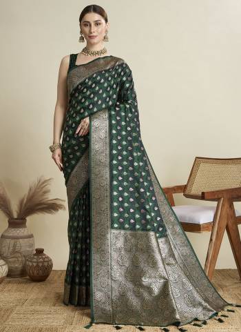 Garb This Party Wear Saree Paired With Blouse.This Saree And Blouse Are Satin Silk Fabric With Wevon Jari Designer. Buy This Pretty Saree Now.