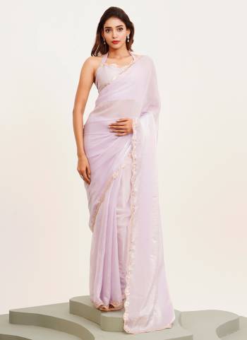 Garb These Fancy Party Wear Saree in Fine Colored.These Saree Are Tissue And Blouse is Fabricated On Art Silk Pair.Its Beautified With Fancy Sequinned Work Disigner Saree.