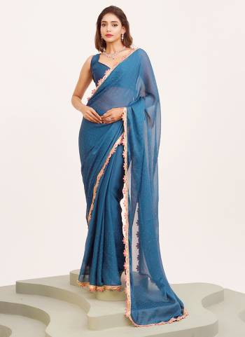 Garb These Fancy Party Wear Saree in Fine Colored.These Saree Are Chiffon And Blouse is Fabricated On Art Silk Pair.Its Beautified With Fancy Sequinned Work Disigner Saree.