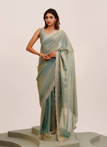 Garb These Fancy Party Wear Saree in Fine Colored.These Saree Are Satin And Blouse is Fabricated On Art Silk Pair.Its Beautified With Fancy Beads,Stone Work Disigner Saree.