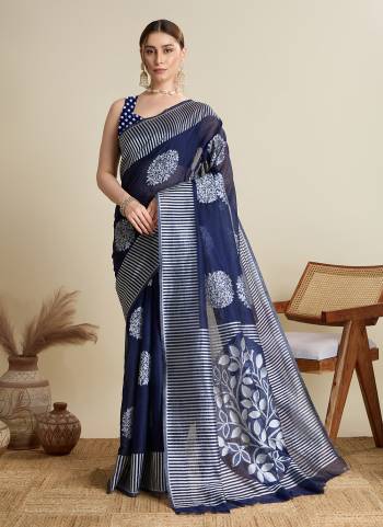 Garb This Party Wear Saree Paired With Blouse.This Saree And Blouse Are Soft Silk Fabric With Wevon Lining,Butti Designer. Buy This Pretty Saree Now.