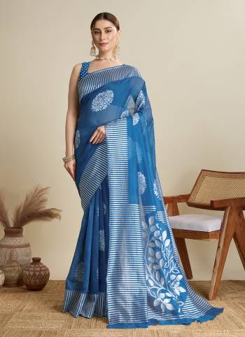 Garb This Party Wear Saree Paired With Blouse.This Saree And Blouse Are Soft Silk Fabric With Wevon Lining,Butti Designer. Buy This Pretty Saree Now.