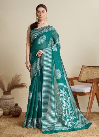 Garb This Party Wear Saree Paired With Blouse.This Saree And Blouse Are Soft Silk Fabric With Wevon Lining,Butti Designer. Buy This Pretty Saree Now.