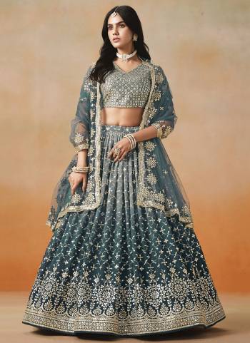 For A Designer Look,Grab These Party Wear Lehenga Choli in Fine Colored.These Lehenga And Blouse Are Fabricated On Georgette Pair With Dupatta Are Soft Net.Its Beautified With Pedding Color,Designer Jari,Sequance Embroidery Work.