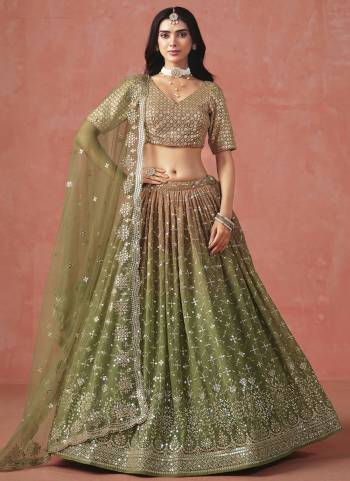 For A Designer Look,Grab These Party Wear Lehenga Choli in Fine Colored.These Lehenga And Blouse Are Fabricated On Georgette Pair With Dupatta Are Soft Net.Its Beautified With Pedding Color,Designer Jari,Sequance Embroidery Work.
